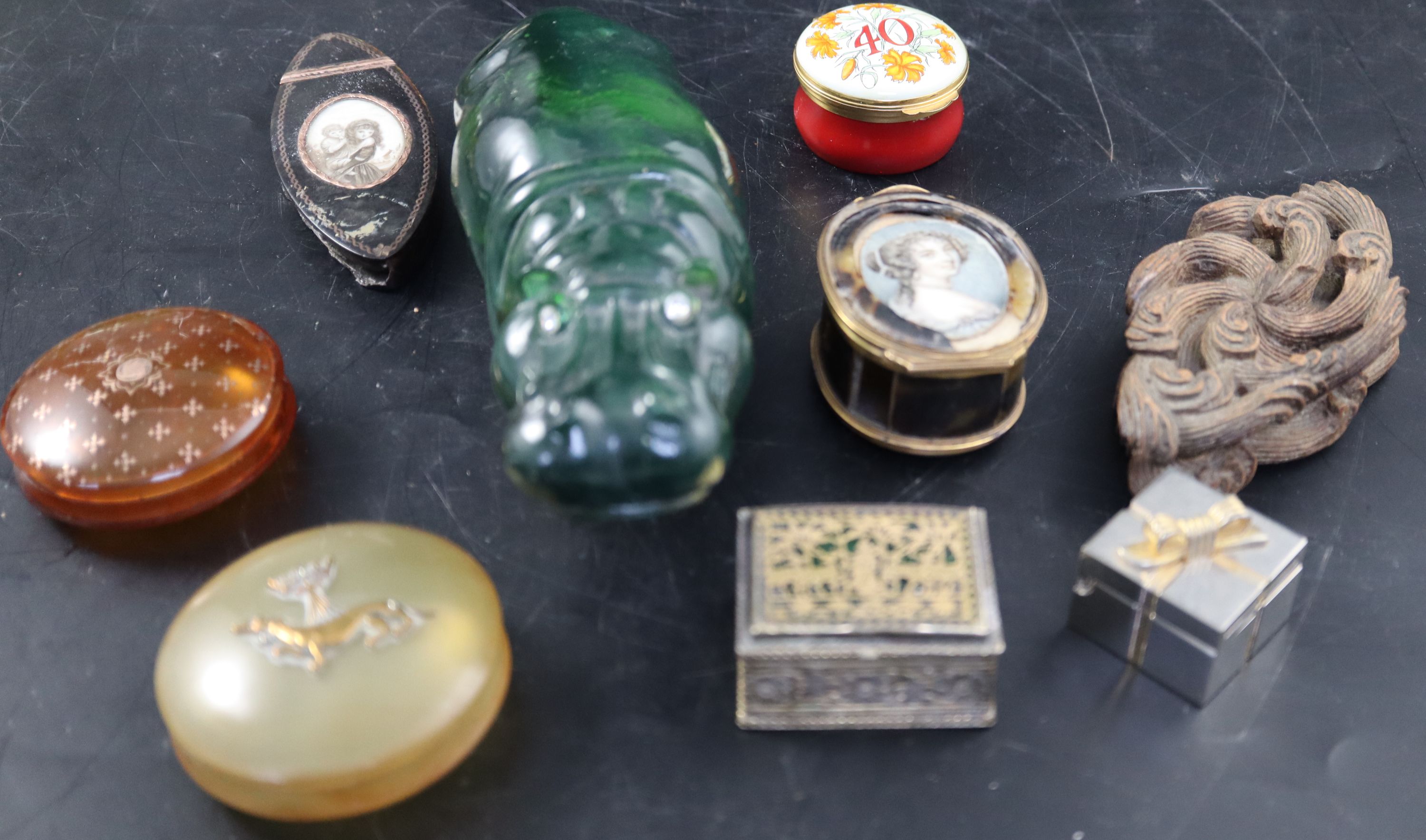 A group of assorted small boxes and objects dart including ivory and tortoiseshell